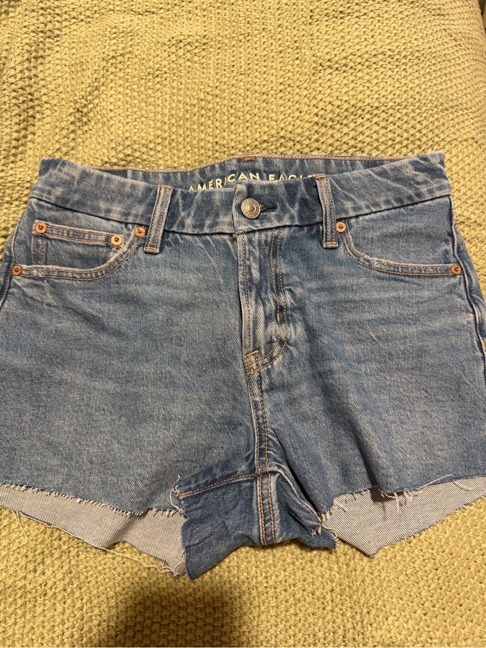 American Eagle Outfitters faded blue denim cutoff shorts